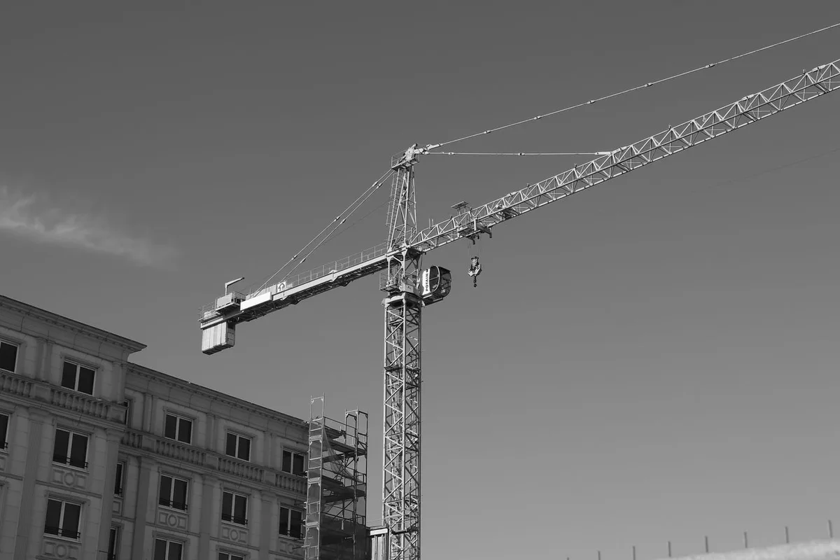 Construction crane over a building site